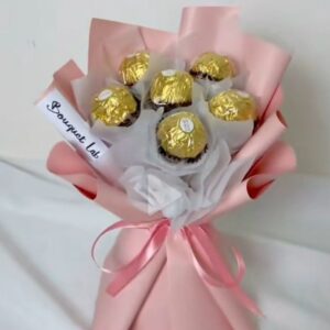 Luxury chocolate bouquet with birthday topper in elegant pastel wrapping by Rosellea